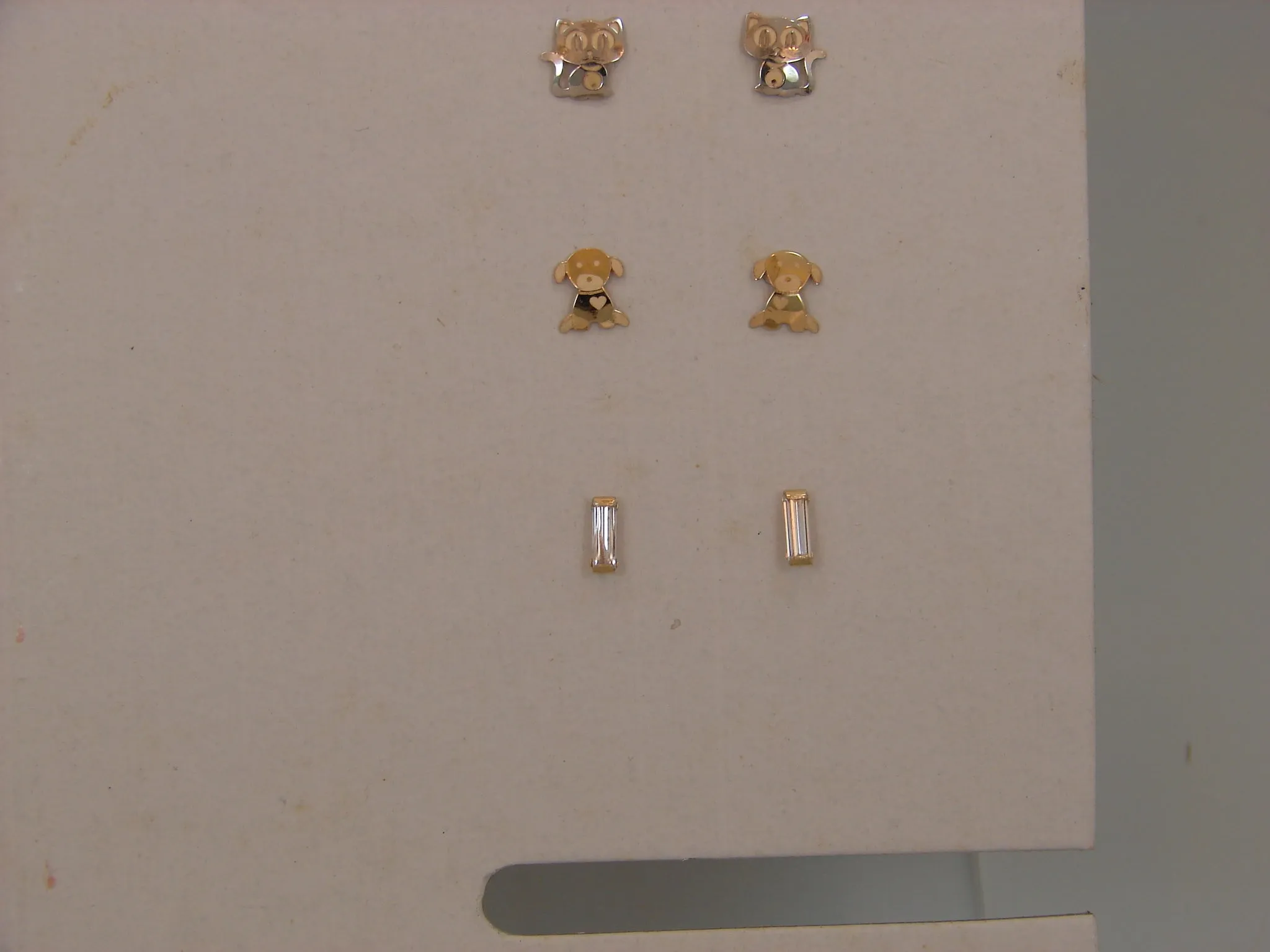 14 KT Tiny Baguette gold screw back earrings