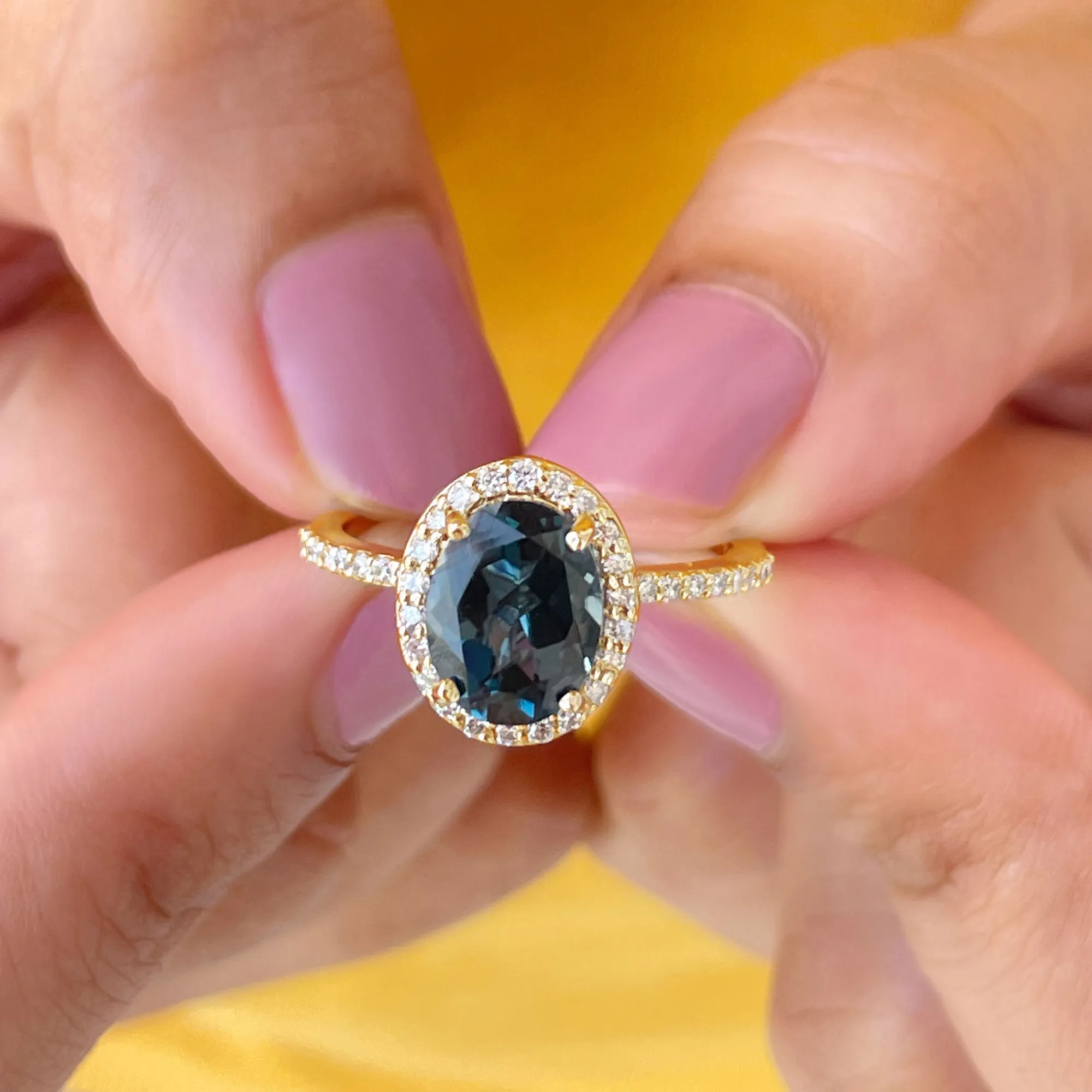 1.75 CT Classic Oval Cut London Blue Topaz Ring with Diamond Halo
