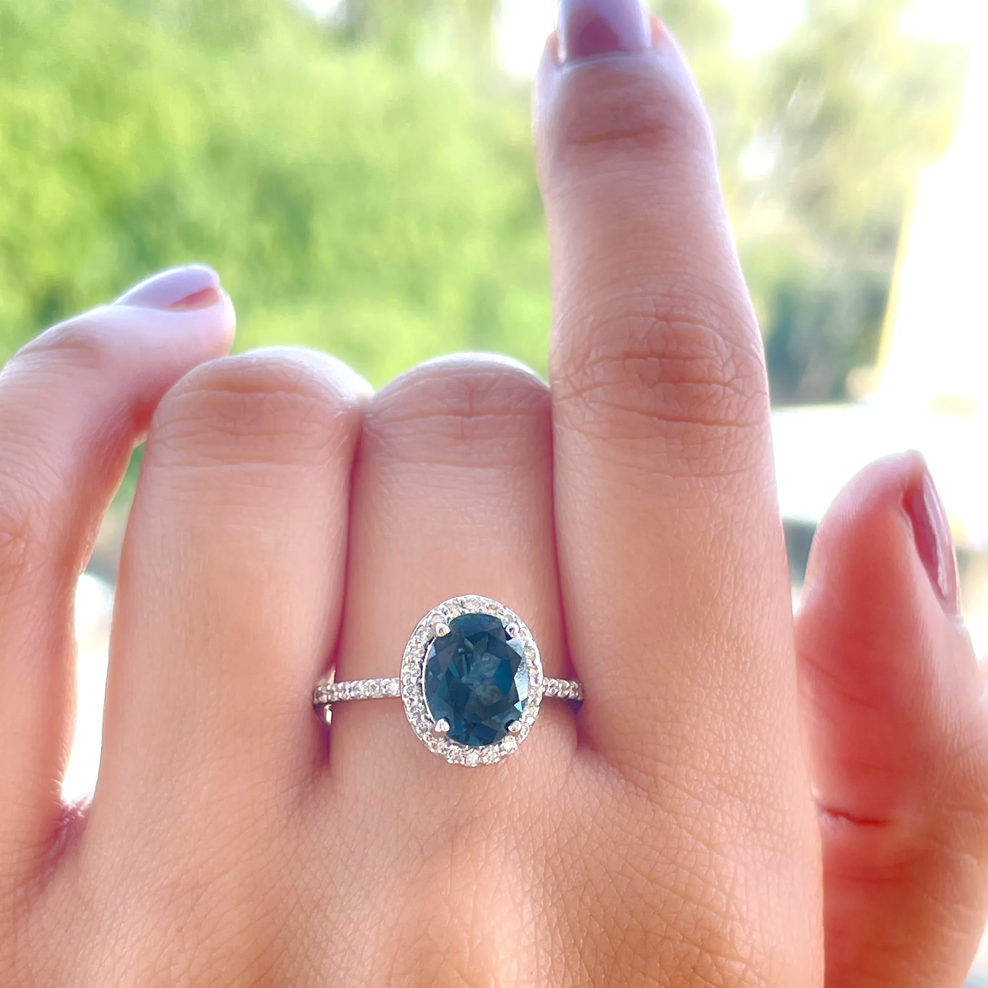 1.75 CT Classic Oval Cut London Blue Topaz Ring with Diamond Halo