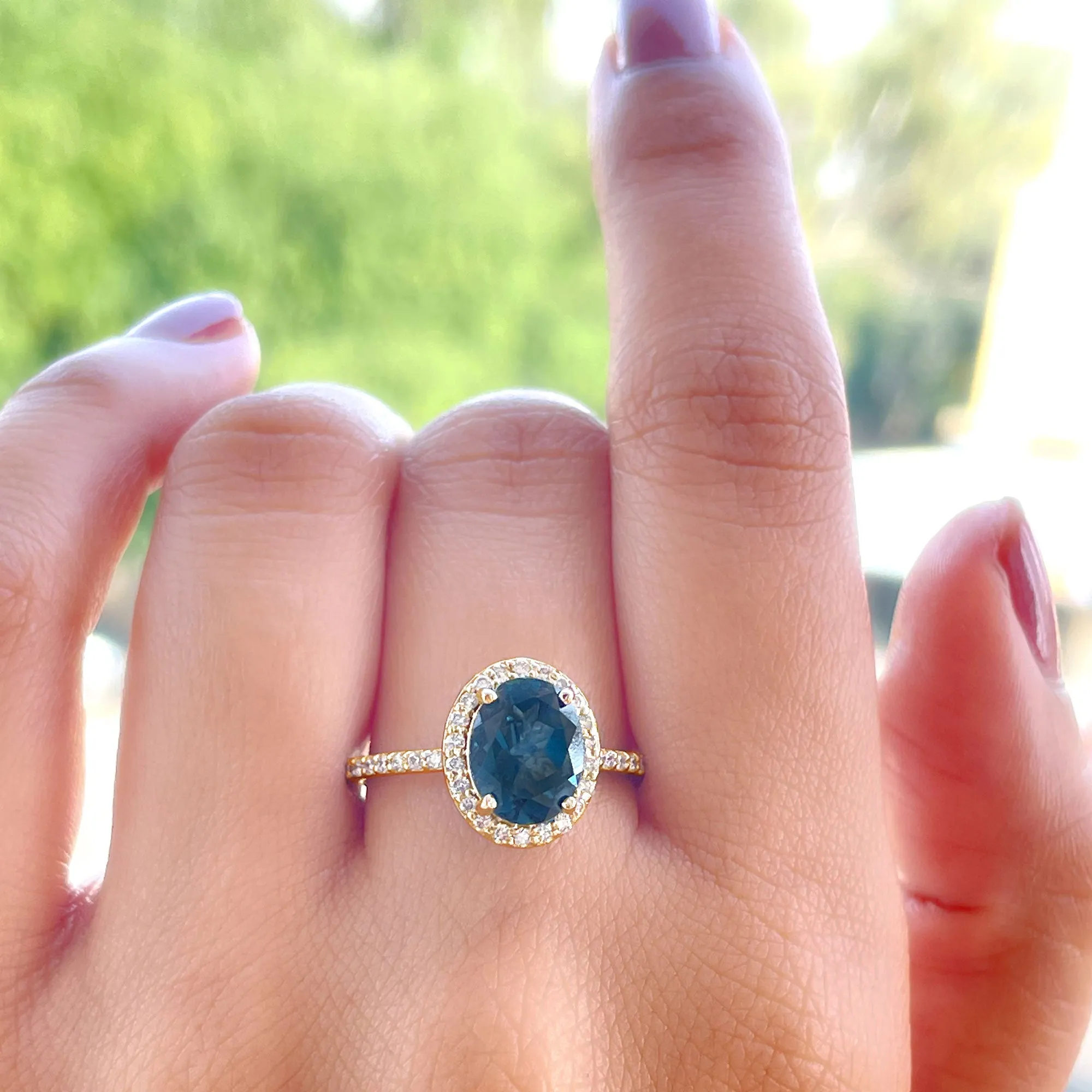 1.75 CT Classic Oval Cut London Blue Topaz Ring with Diamond Halo