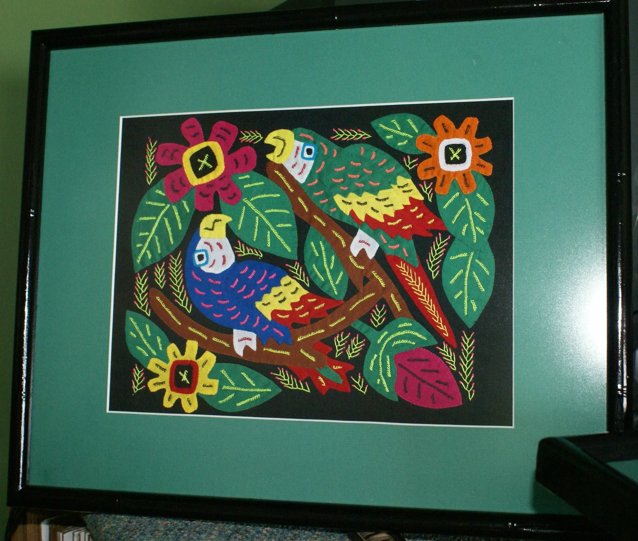 A Kuna Indian Folk Art Mola from San Blas Islands, in Custom Frame with 1 Green Mat & Non-Glare Glass : Hand stitched Textile Applique: Colorful Macaw Parrots & Hibiscus Flowers, 19" x 15" (DFM16) Wall Décor