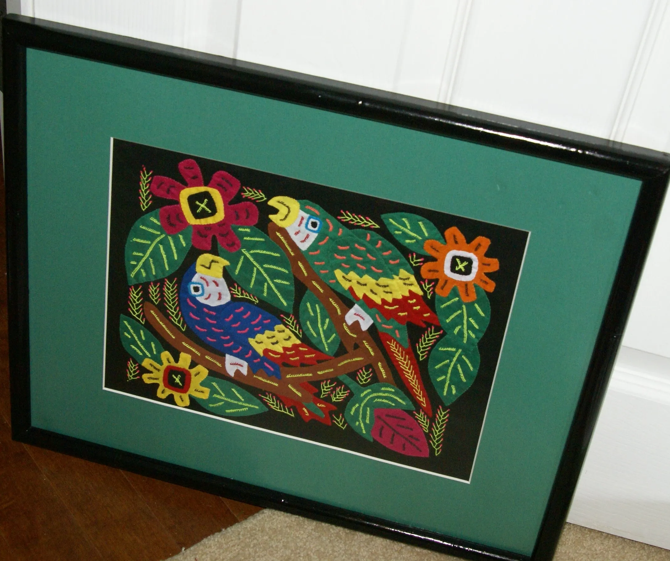 A Kuna Indian Folk Art Mola from San Blas Islands, in Custom Frame with 1 Green Mat & Non-Glare Glass : Hand stitched Textile Applique: Colorful Macaw Parrots & Hibiscus Flowers, 19" x 15" (DFM16) Wall Décor