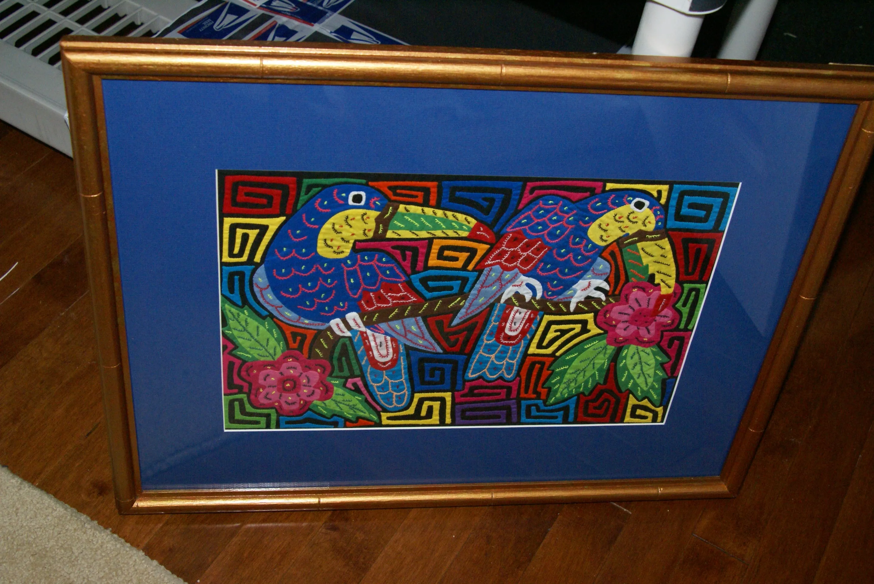 A Kuna Indian Folk Art Mola from San Blas Islands, in Custom Hand Painted Frame with 1 Blue Mat & Glass : Hand stitched Textile Applique: Colorful Toucans & Hibiscus Flowers, 22.5" x 17.5" (DFM9) Wall Décor