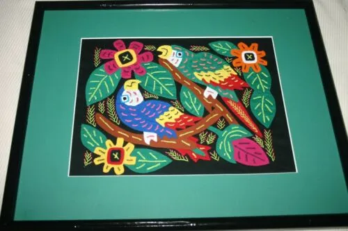 A Kuna Indian Folk Art Mola from San Blas Islands, Panama. Wall Decor, in Custom Frame & Mat. Hand stitched Textile Applique: Colorful Parrot & Hibiscus Flowers, plants 16" x 12" (DFM3)