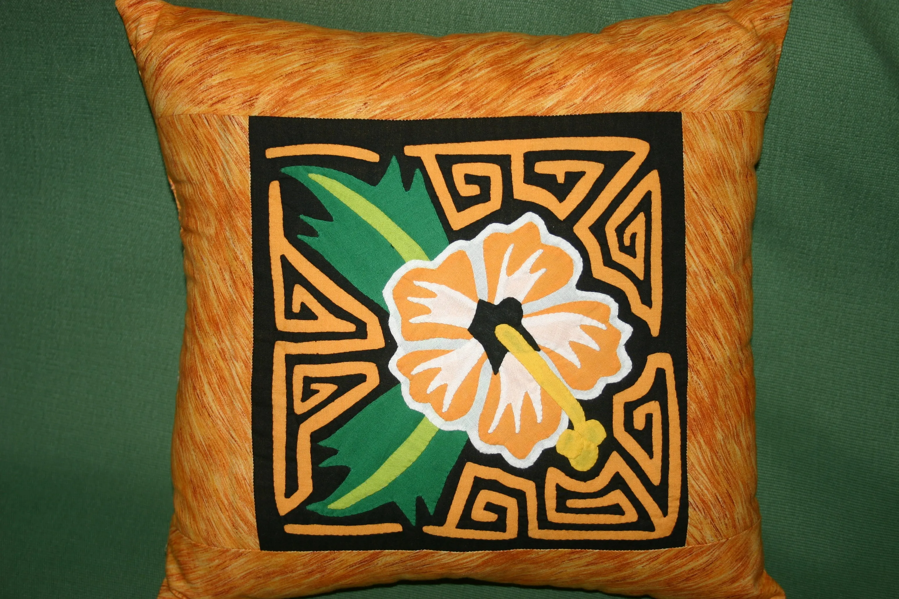 A Kuna Indian Folk Art Mola from San Blas Islands, Panama. Wall Decor, in Custom Frame & Mat. Hand stitched Textile Applique: Colorful Parrot & Hibiscus Flowers, plants 16" x 12" (DFM3)