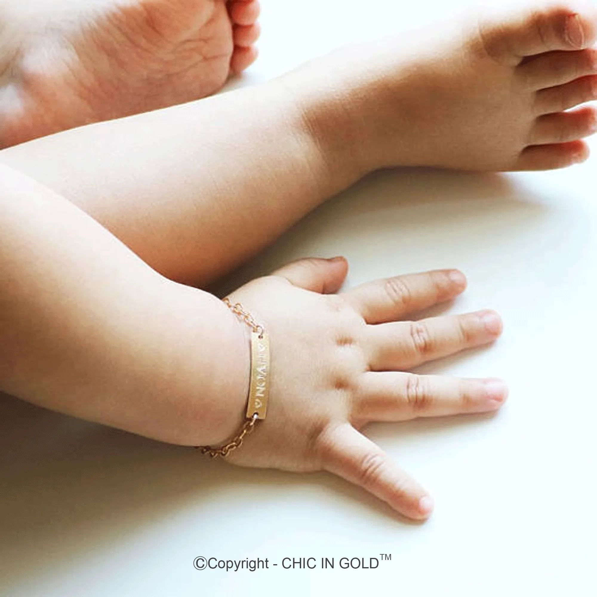 Personalized Baby Name Adjustable bracelet. (14 karat Solid Gold) - CG374B1X.25. Starts at