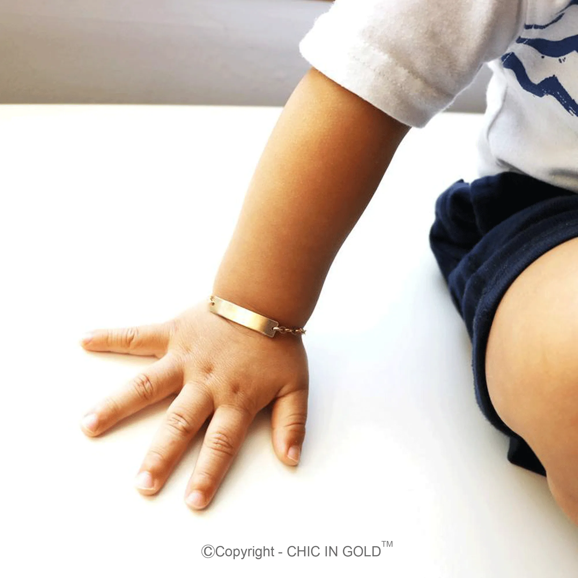 Personalized Baby Name Adjustable bracelet. (14 karat Solid Gold) - CG374B1X.25. Starts at