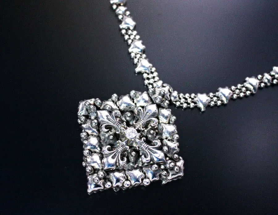 SG Liquid Metal LEN 3714 – Antique silver finish “Fleur de Lys” Cross necklace by Sergio Gutierrez